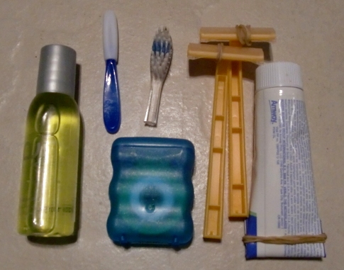 Toiletries: bodywash,intradental brush,toothbrush,floss,disposable razors, paste (122 grs)